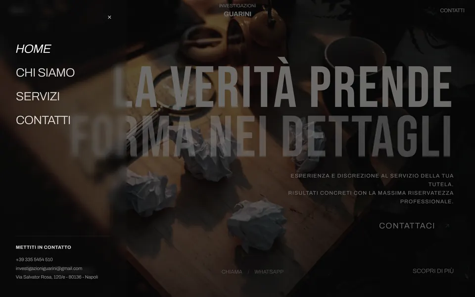 The side menu open on the home page: the pages and, at the bottom, phone, email and address